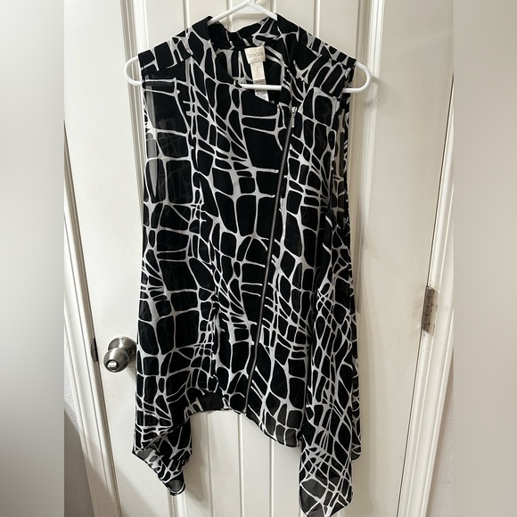 Chico’s black and white vest. Chic animal print with an off-center zipper. - Picture 4 of 8